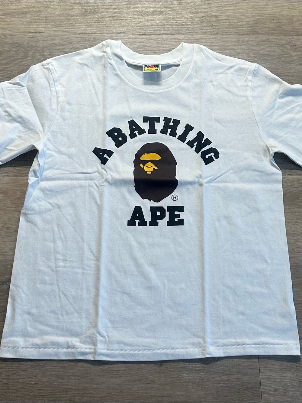 Bape White Short Sleeve T-Shirt with Black & Yellow Ape Head